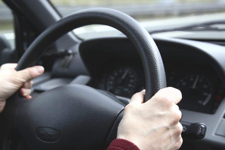 Technician investigates airbag warning light on a car