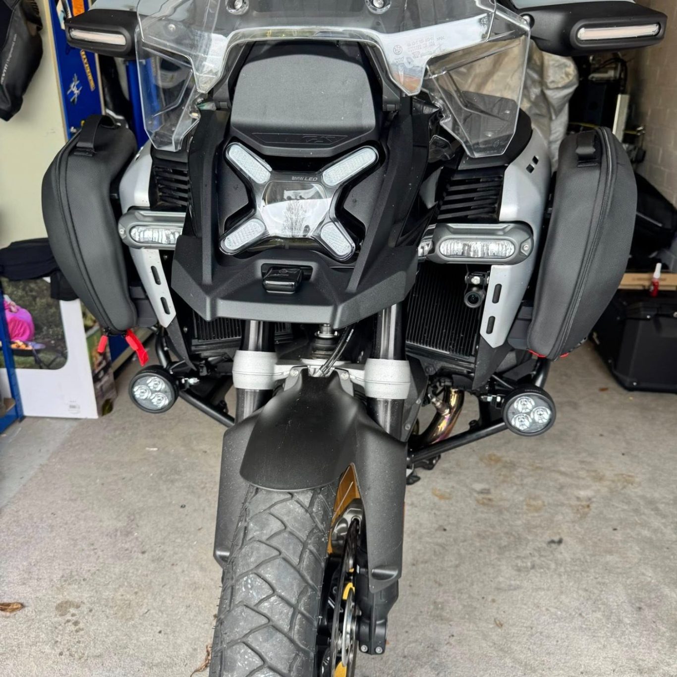 Close-up of INNOVV camera, EZCAN and Denali LED spotlights mounted on a bike – Southport Mobile installation
