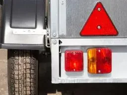 Rear of trailer showing light lenses and electrical systems
